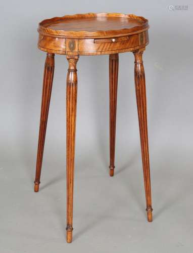 A George III satinwood kettle stand