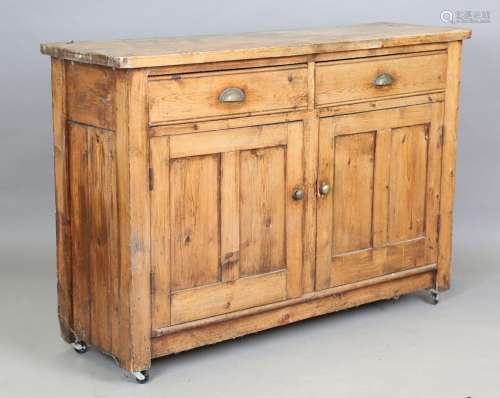 A late Victorian pine kitchen cabinet