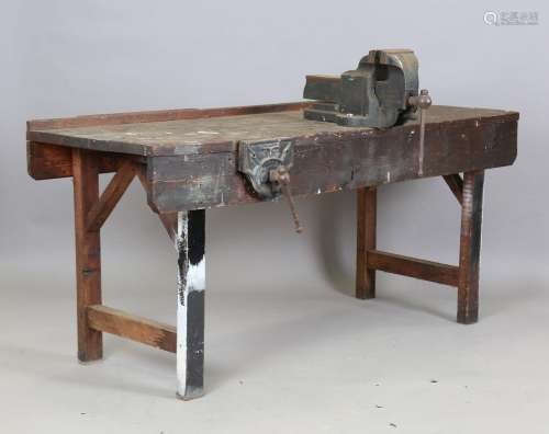An early/mid-20th century pine work bench