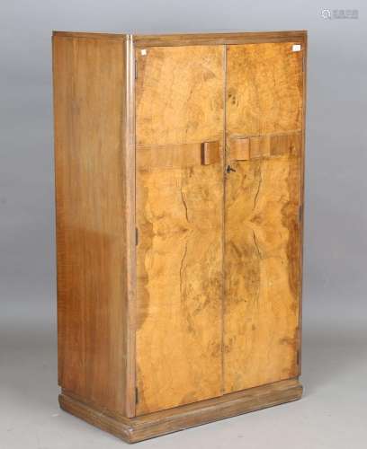 An Art Deco walnut cabinet
