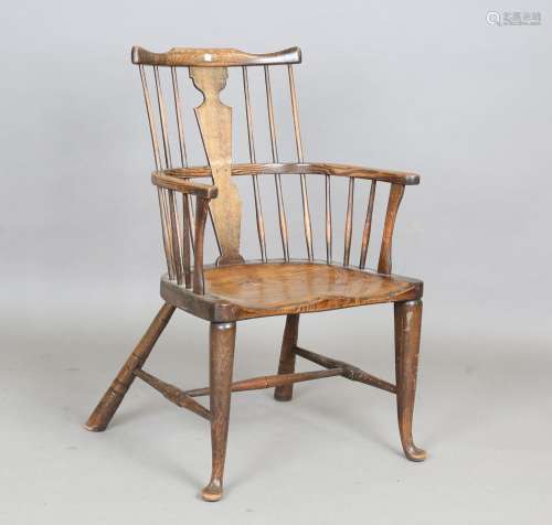 An early 20th century beech and elm stick back Windsor armch...