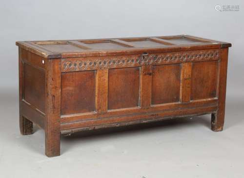 A late 17th/early 18th century panelled oak coffer with orig...