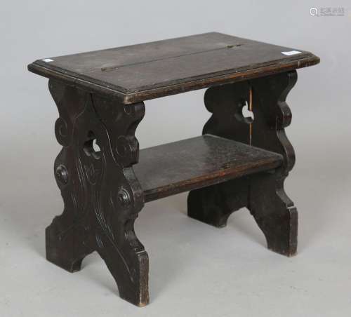 A late 19th century oak metamorphic stool with hinged top an...