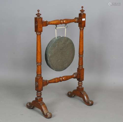 A late Victorian turned oak dinner gong
