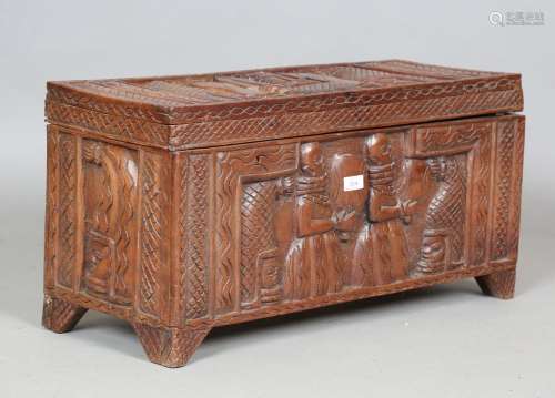 A mid-20th century Nigerian carved hardwood chest