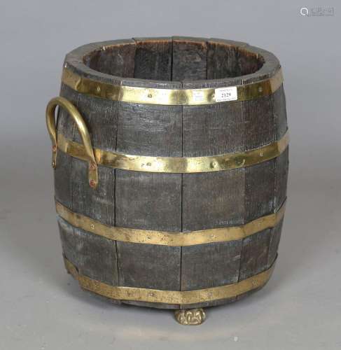 A 20th century coopered oak and brass bound log bin with app...
