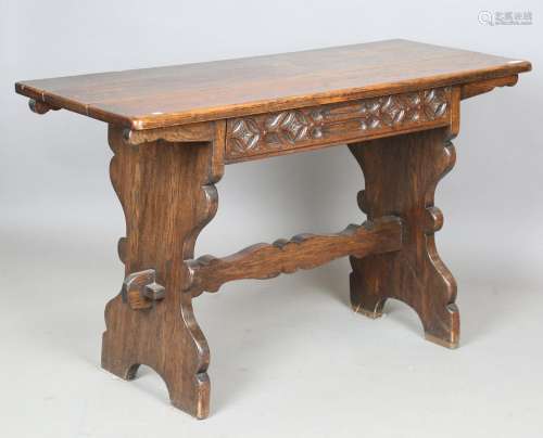 An early 20th century Jacobean style oak hall table