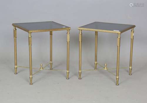 A pair of mid-20th century French gilt brass and black glass...