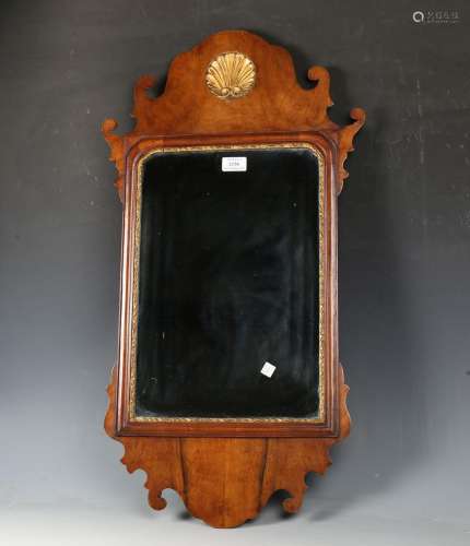 A 20th century George III style walnut fretwork wall mirror ...