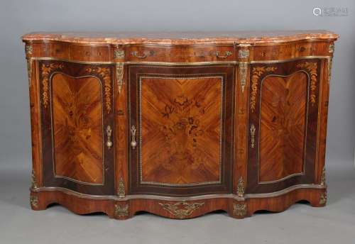 A 20th century kingwood credenza with shaped marble top and ...