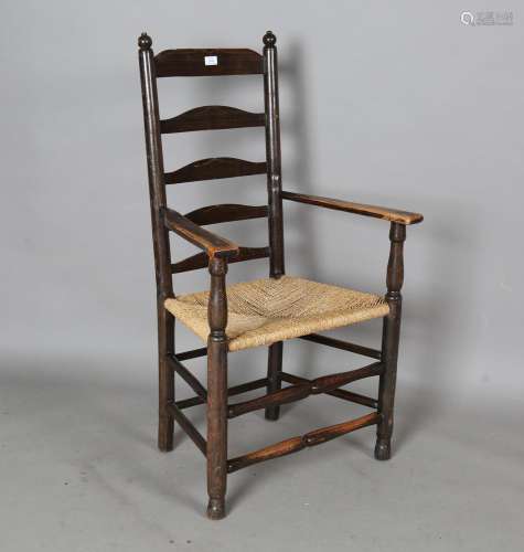 A late 19th century provincial ash ladder back armchair