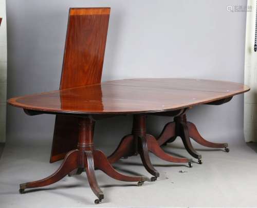 A large George III and later mahogany 'D' end triple pedesta...