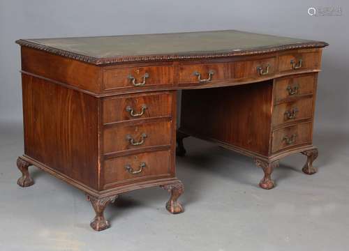 A George V mahogany twin pedestal desk by Wolfe & Hollan...