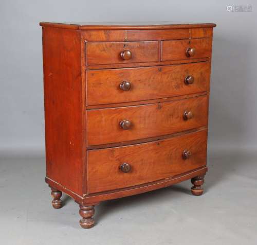 A Victorian mahogany bowfront chest of two short and three l...