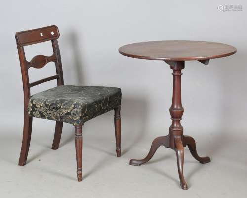 A George III mahogany circular tip-top wine table