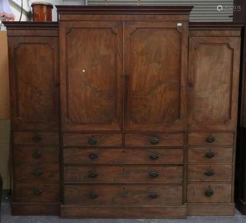 A George III mahogany breakfront wardrobe