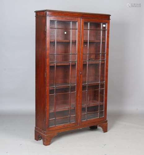 A late Victorian mahogany bookcase cabinet