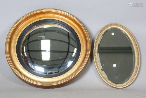 A Regency gilt painted circular convex wall mirror