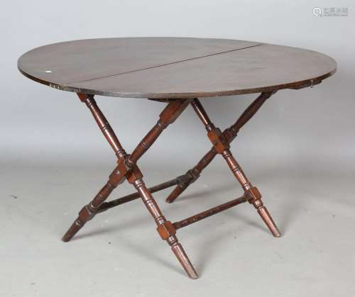 An early 20th century mahogany folding circular table by Tho...