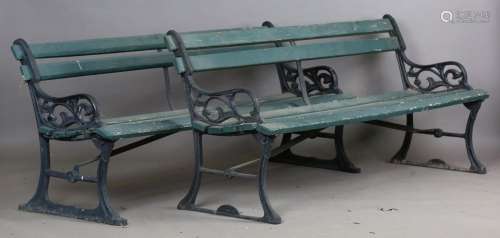 A pair of early 20th century cast iron and slatted wooden ga...