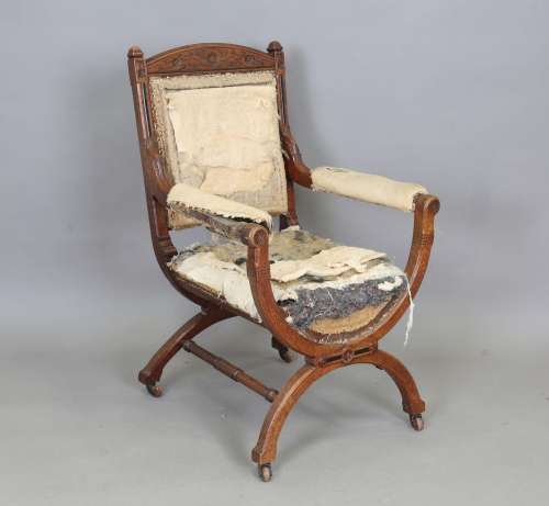 A late Victorian Aesthetic Movement oak framed armchair, in ...
