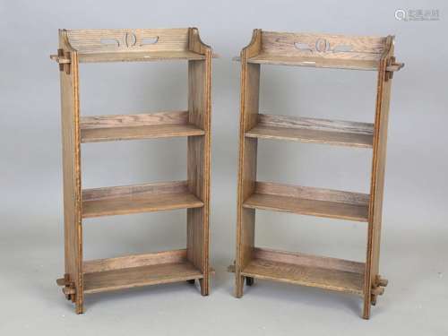 A pair of early 20th century Arts and Crafts style oak open ...