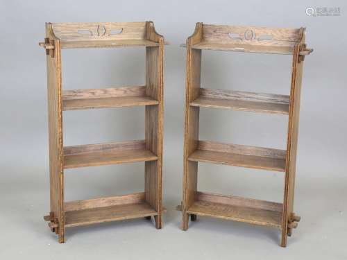A pair of early 20th century Arts and Crafts style oak open ...