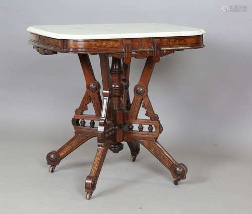 A late Victorian Aesthetic Movement walnut centre table with...