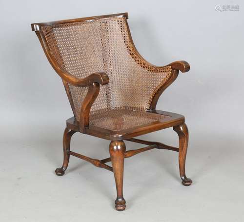 An early 20th century Arts and Crafts stained beech bergère ...