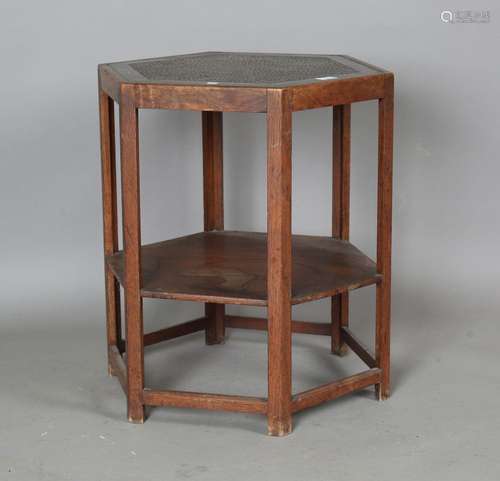 An early 20th century Arts and Crafts elm and walnut hexagon...