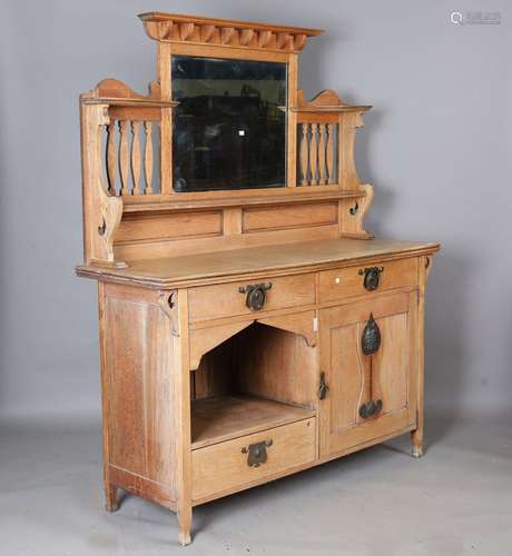 An Edwardian Arts and Crafts oak dresser, in the manner of L...