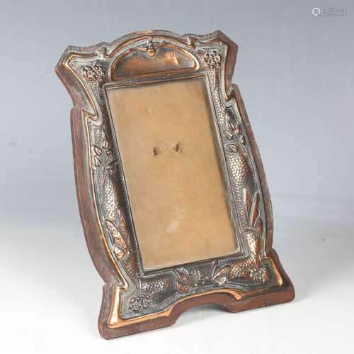 An early 20th century Arts and Crafts pressed copper photogr...