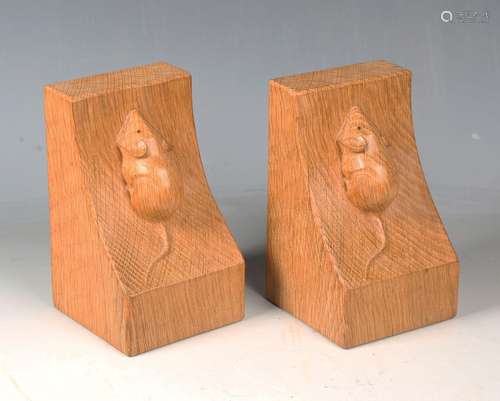 A pair of Robert 'Mouseman' Thompson oak bookends, each carv...