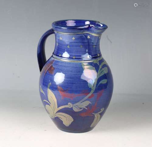 A Jonathan Chiswell Jones studio pottery lustreware jug, dec...