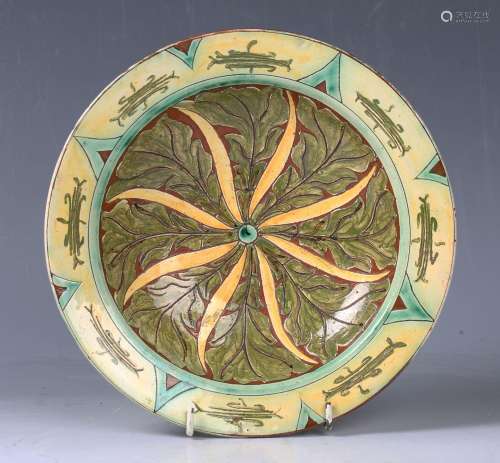 A Della Robbia pottery circular dish, circa 1900, decorated ...