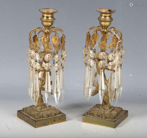 A pair of Regency gilt metal single-light table lustres, hun...