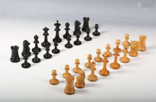 A late Victorian ebony and boxwood Staunton chess set, heigh...