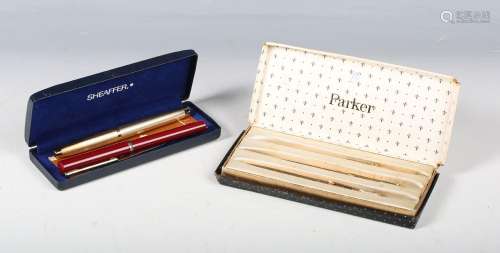 A Sheaffer USA gold plated fountain pen with engine turned d...