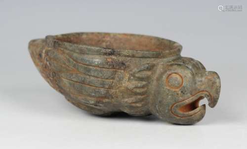 A pre-Columbian Mayan style carved green hardstone zoomorphi...