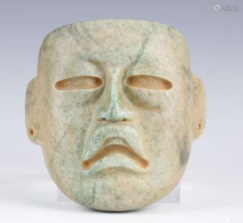 A large pre-Columbian Olmec style finely carved green hardst...
