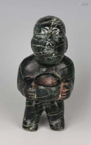 A pre-Columbian Olmec style carved variegated dark green har...