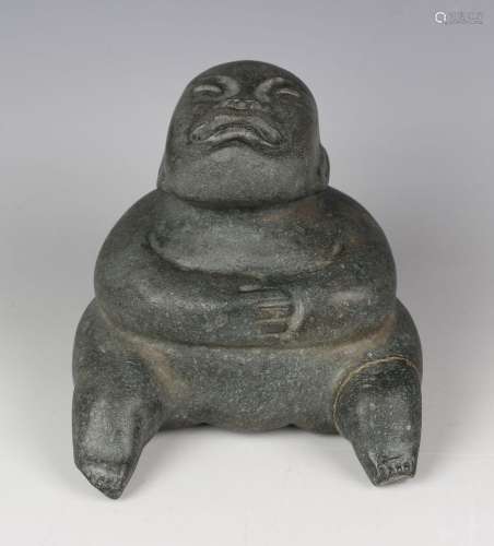 A pre-Columbian Olmec style carved green hardstone figure, p...