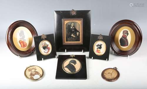 A 19th century silhouette of a gentleman, framed and mounted...