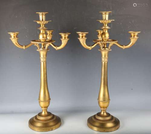 A pair of 19th century Regency style ormolu four-light cande...