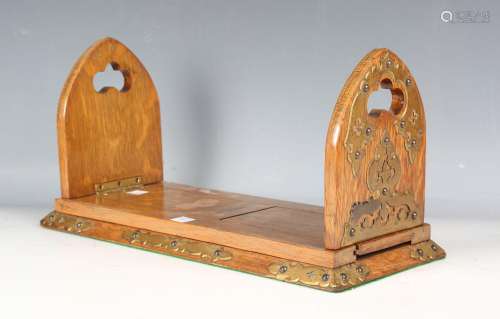 A Victorian Gothic Revival oak and gilt brass mounted extend...