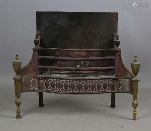 An early 20th century George III style brass and steel fire ...