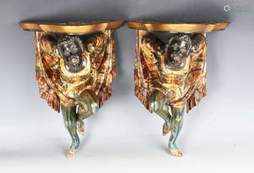 A pair of 19th century Venetian giltwood and polychrome pain...