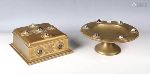 A late Victorian Gothic Revival square brass casket, the hin...