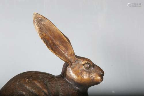 A modern brown patinated cast bronze model of a hare, unsign...
