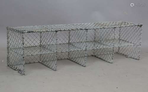 A mid-20th century wirework eight-division shoe rack, height...